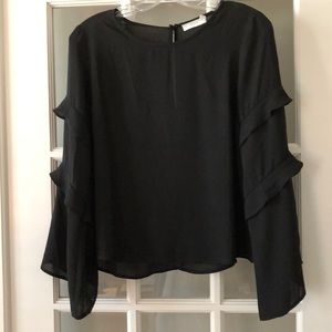 Black ruffle sleeve top
